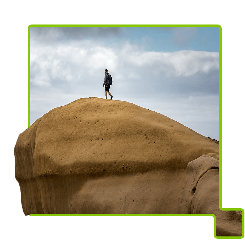 Man walking on a cliff